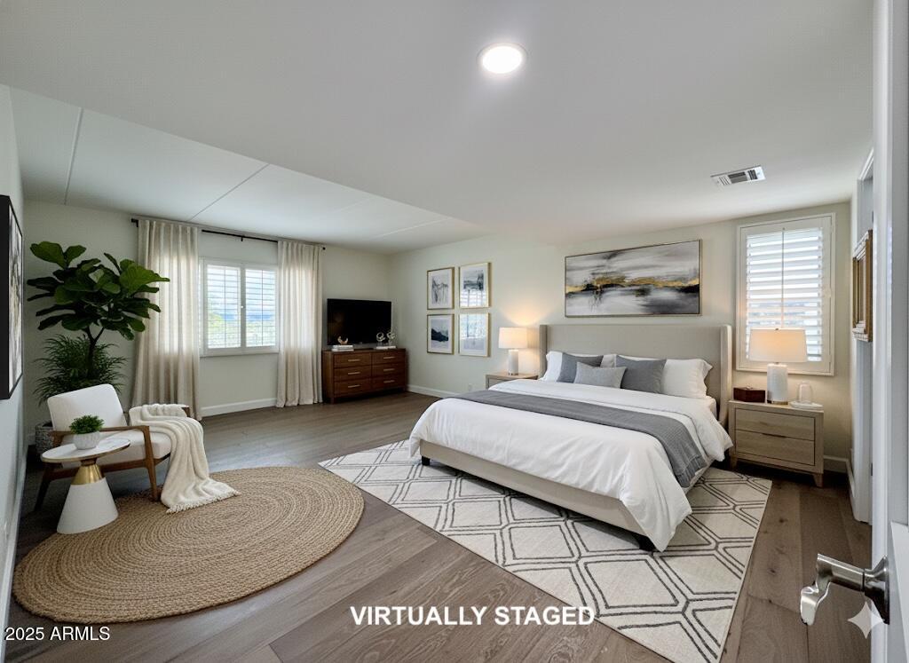 7930 East Camelback Road, Unit 709 Scottsdale, AZ 85251 - Photo 19 of 41 a bedroom with a bed and window