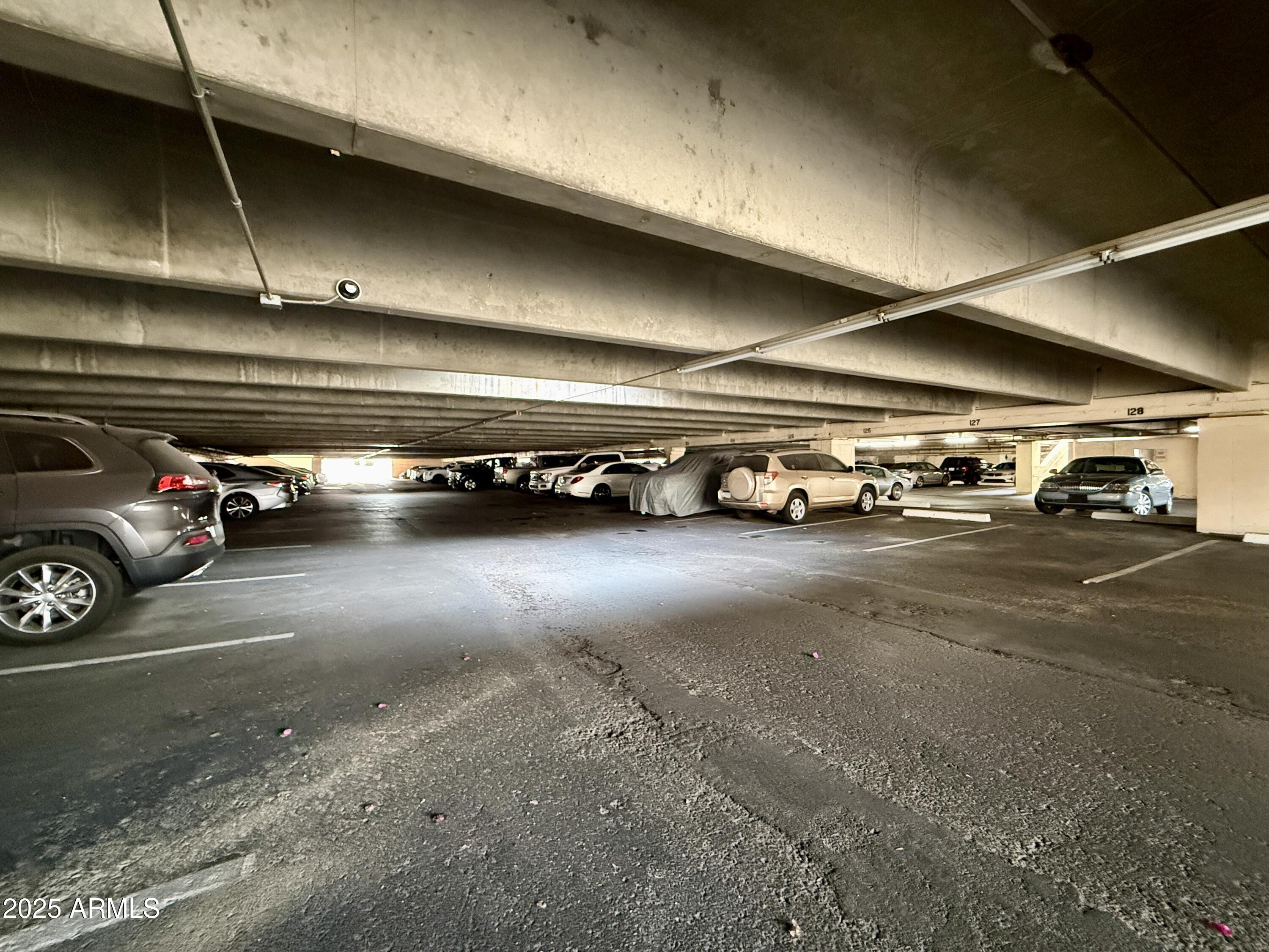 7930 East Camelback Road, Unit 709 Scottsdale, AZ 85251 - Photo 32 of 41 a view of car garage