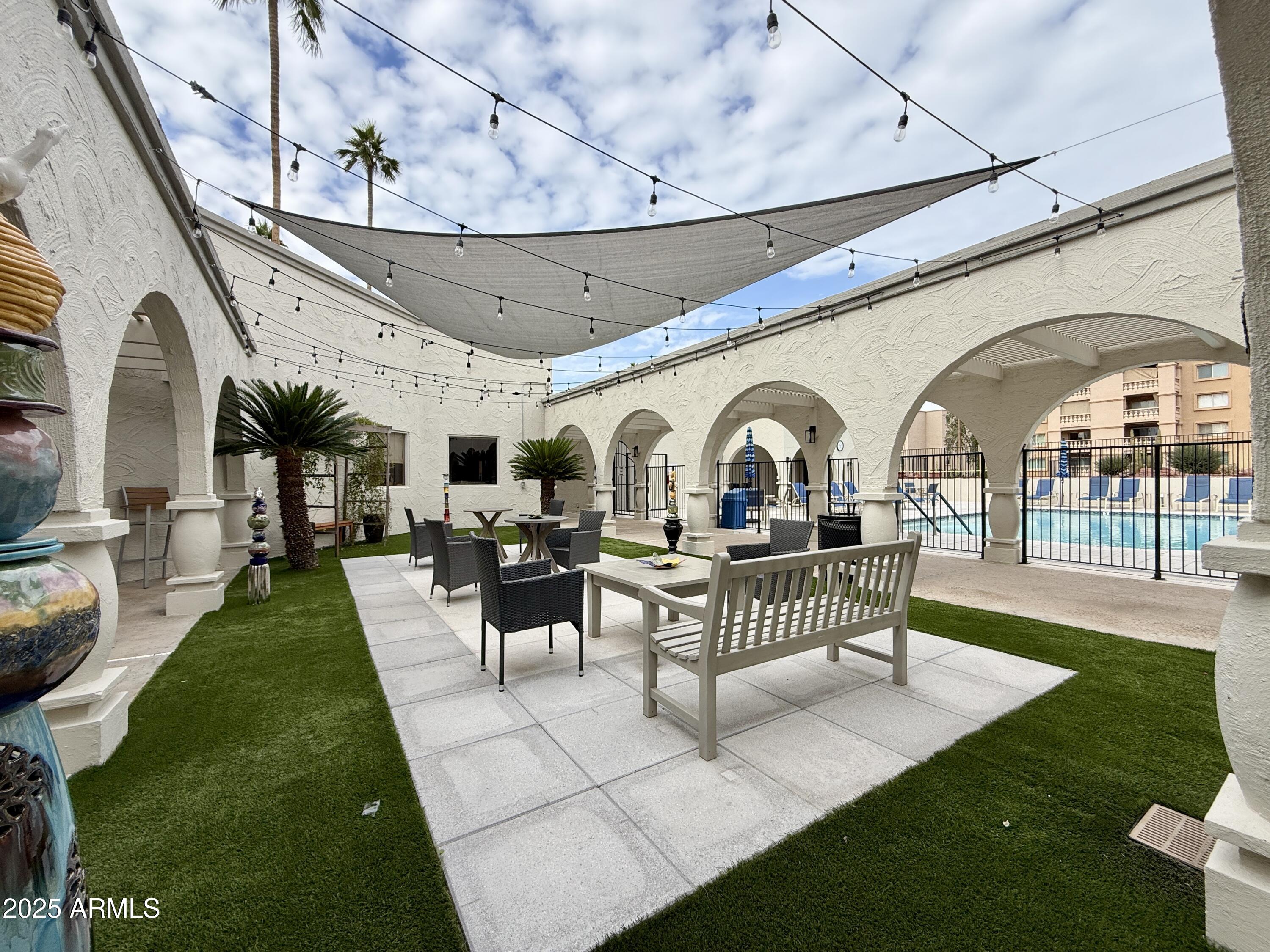 7930 East Camelback Road, Unit 709 Scottsdale, AZ 85251 - Photo 35 of 41 a view of a garden with patio