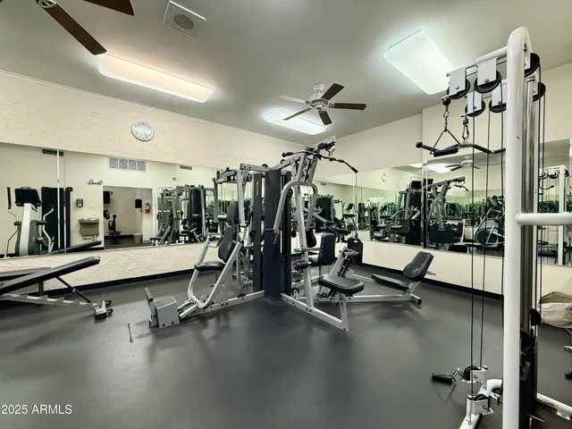a room with furniture and pool table