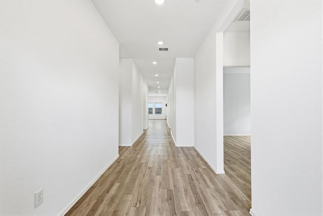 a view of small space with wooden floor