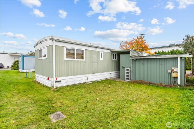 a view of a backyard with a garden