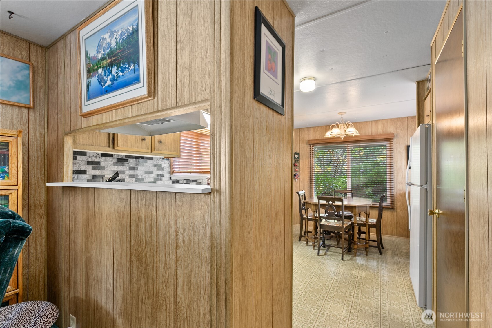 2522 Old Highway 99 South Road, Unit 2 Mount Vernon, WA 98273 - Photo 8 of 20 a dining room with furniture and a painting on the wall