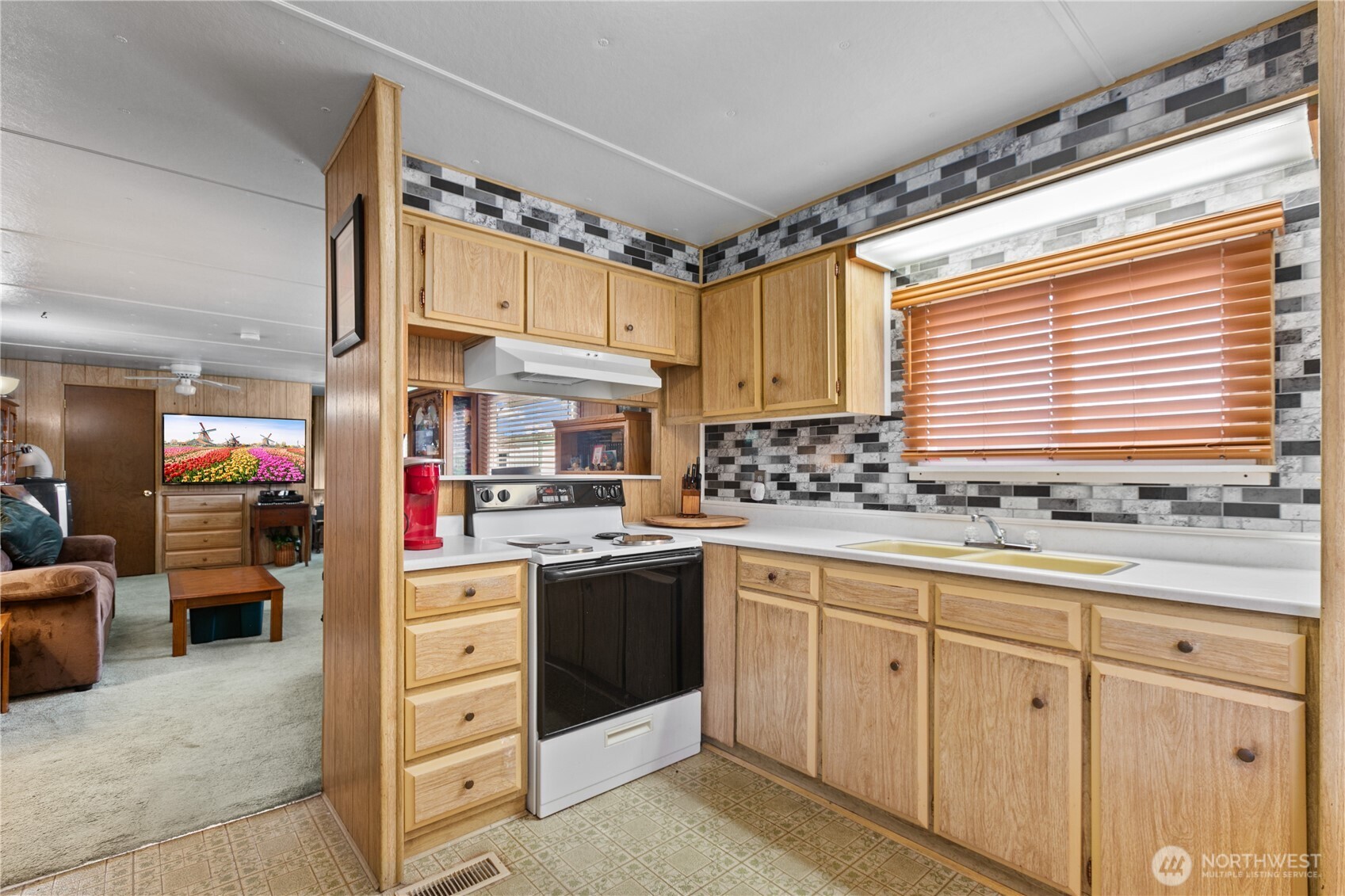 2522 Old Highway 99 South Road, Unit 2 Mount Vernon, WA 98273 - Photo 9 of 20 a kitchen with cabinets and window