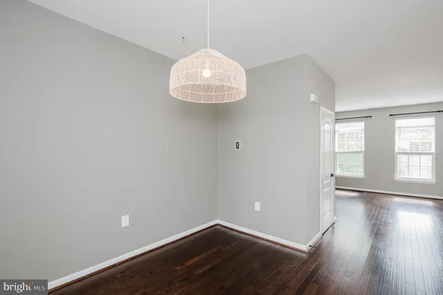 a kitchen with a sink and a window