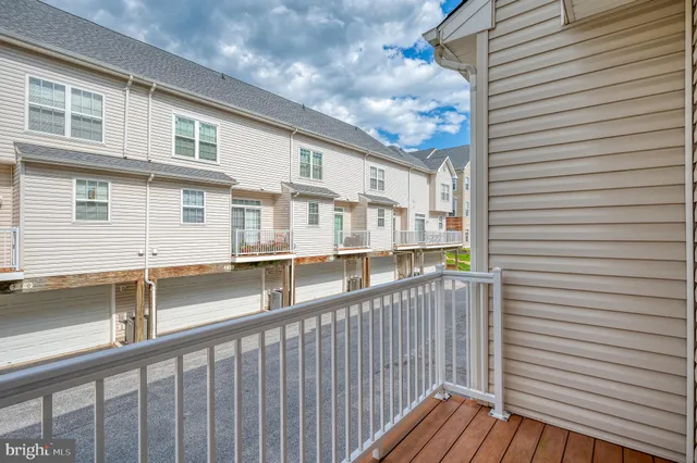 a front view of a house with outdoor space
