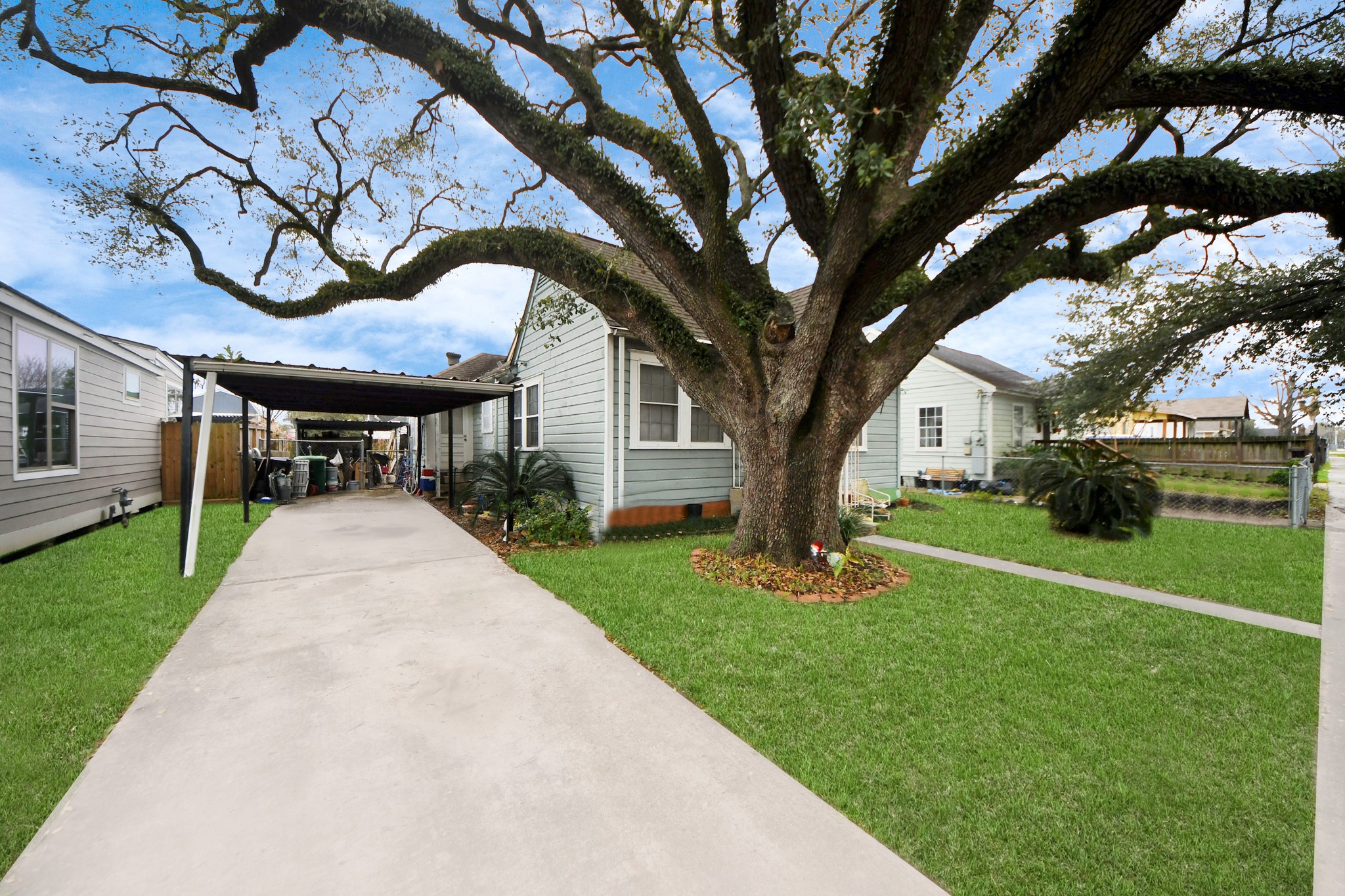 5134 Leeland Street Houston, TX 77023 - Photo 5 of 28 a view of a house with backyard porch and garden