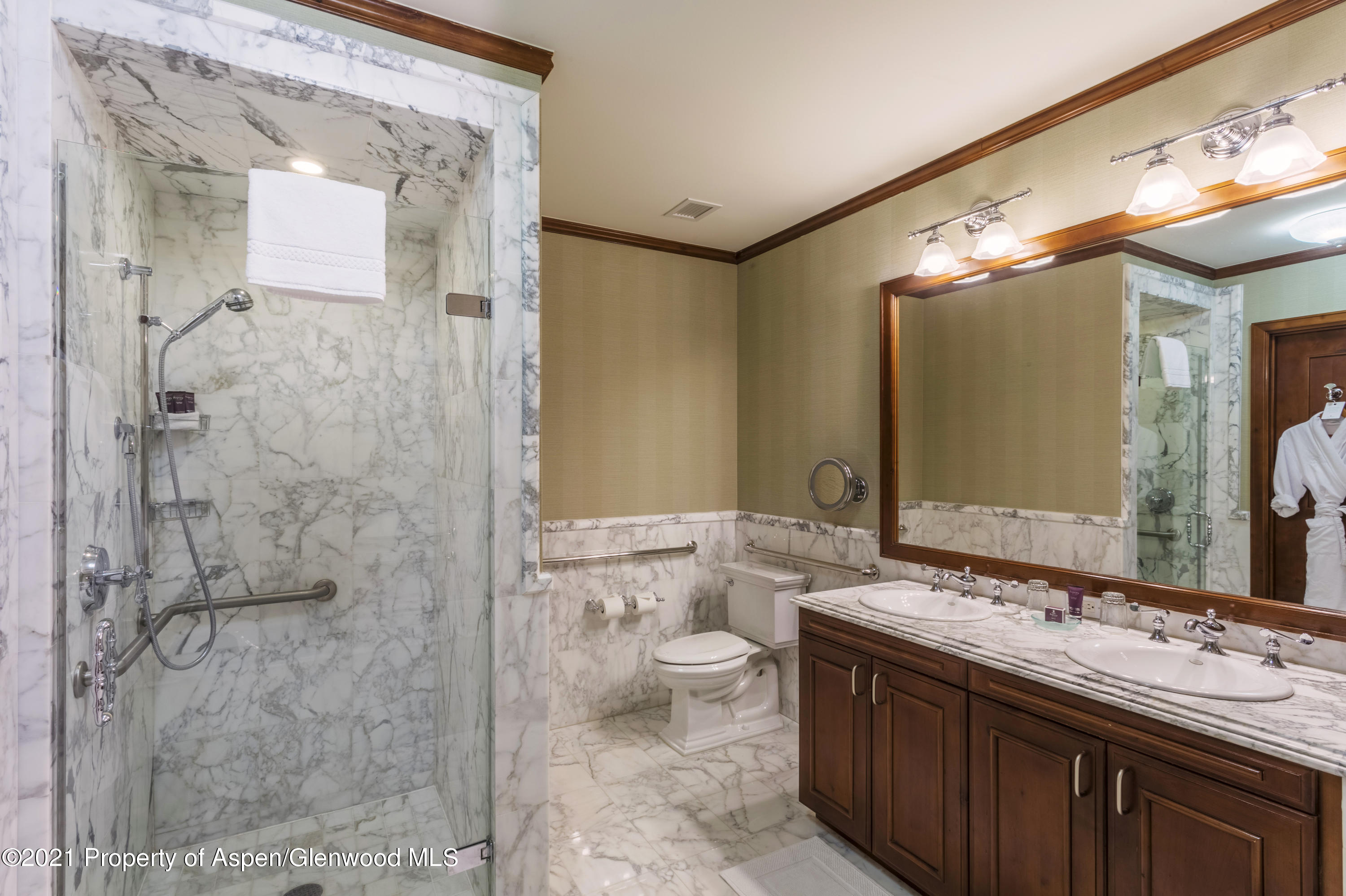 197 Prospector Road, Unit 2412 SUMMER INTEREST #10 Aspen, CO 81611 - Photo 18 of 22 a bathroom with a double vanity sink mirror double and shower