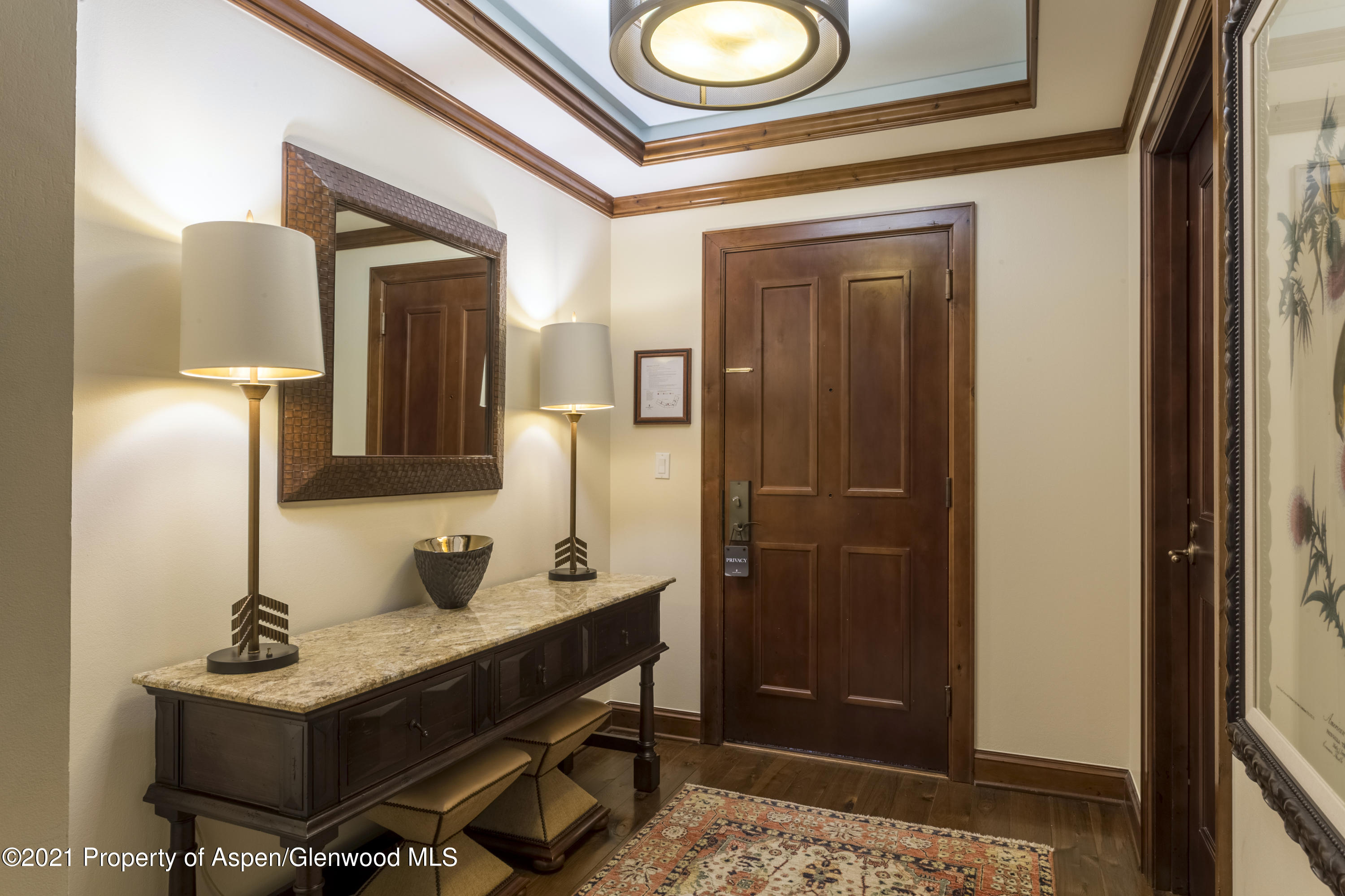 197 Prospector Road, Unit 2412 SUMMER INTEREST #10 Aspen, CO 81611 - Photo 10 of 22 a bathroom with a sink and a mirror