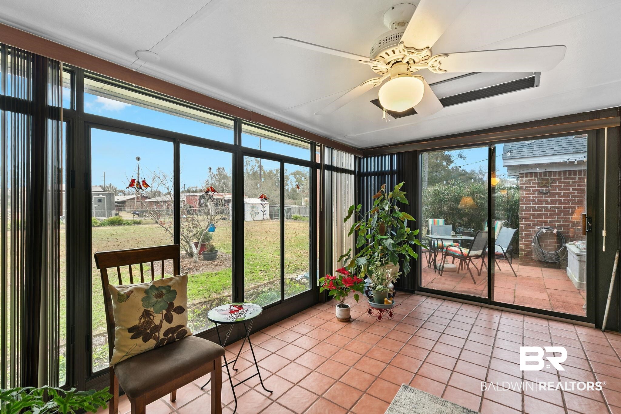 519 Juniper Place Drive Foley, AL 36535 - Photo 9 of 47 Sunroom with tiled floors and view of patio