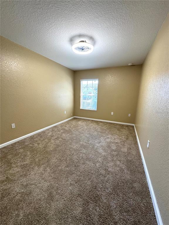7752 Moser Avenue Windermere, FL 34786 - Photo 18 of 22 an empty room with windows