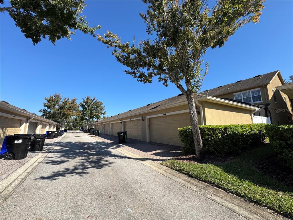 7752 Moser Avenue Windermere, FL 34786 - Photo 22 of 22 a view of a house with a tree in the background