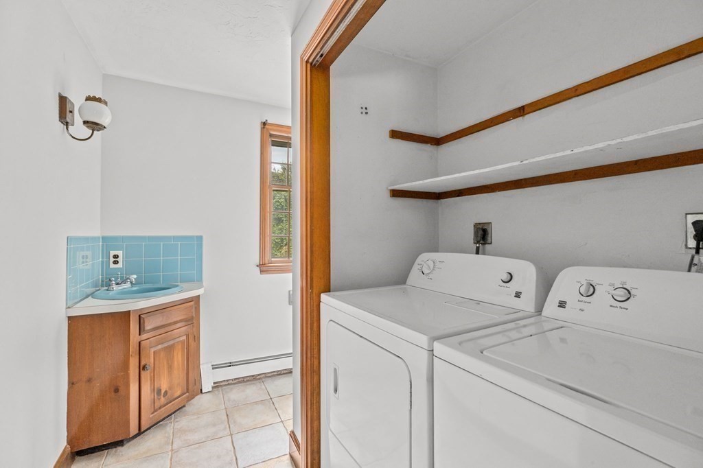 7 Conihasset Road Scituate, MA 02066 - Photo 19 of 34 a utility room with dryer and washer