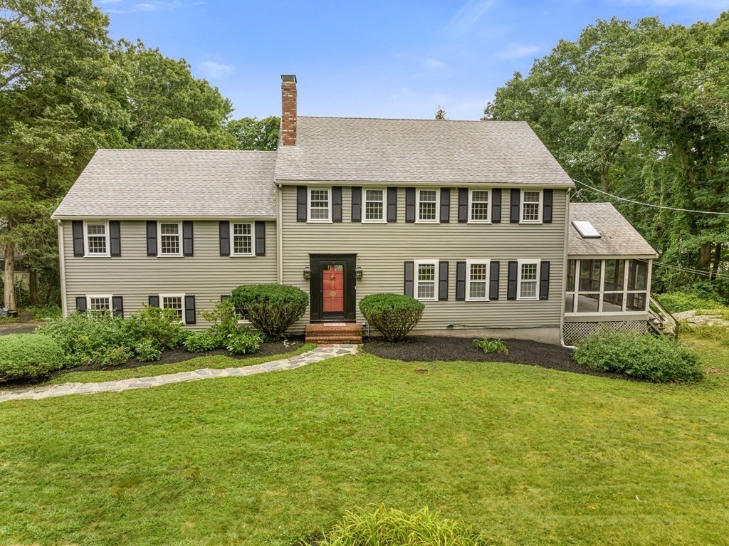 7 Conihasset Road Scituate, MA 02066 - Photo 29 of 34 a front view of a house with a yard