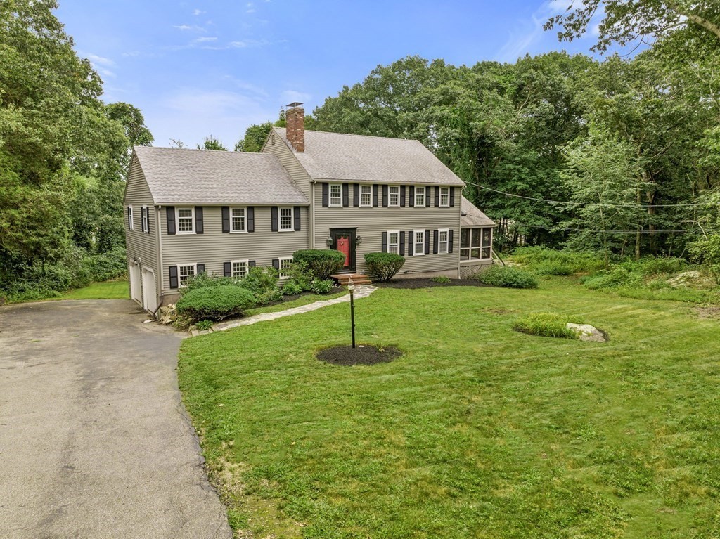 7 Conihasset Road Scituate, MA 02066 - Photo 30 of 34 a front view of a house with a yard