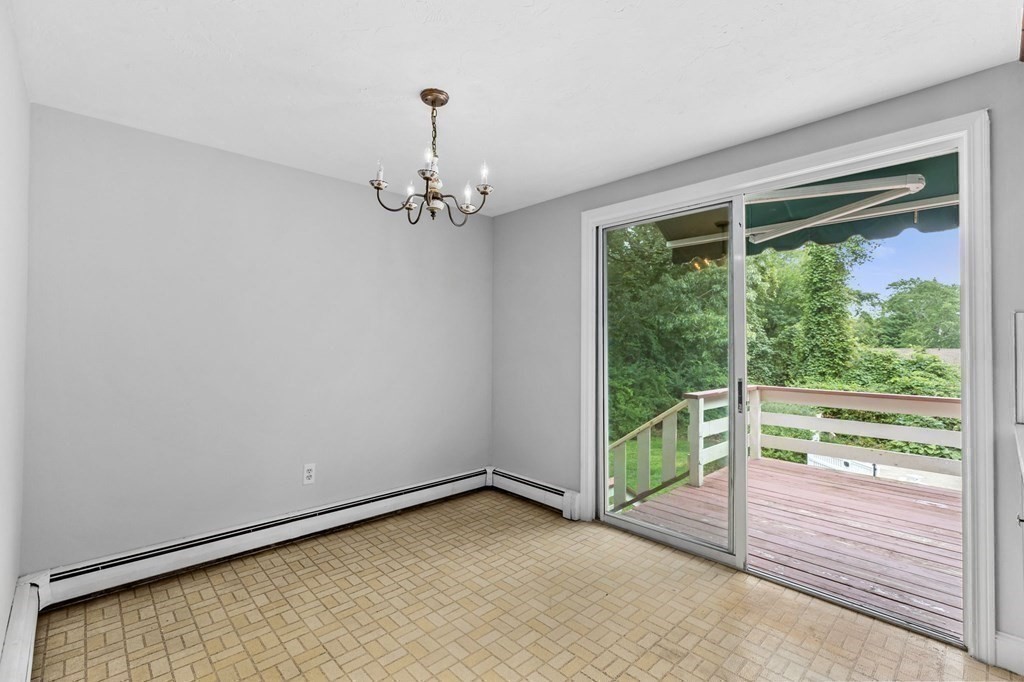 7 Conihasset Road Scituate, MA 02066 - Photo 10 of 34 a view of empty room with wooden floor and outdoor view