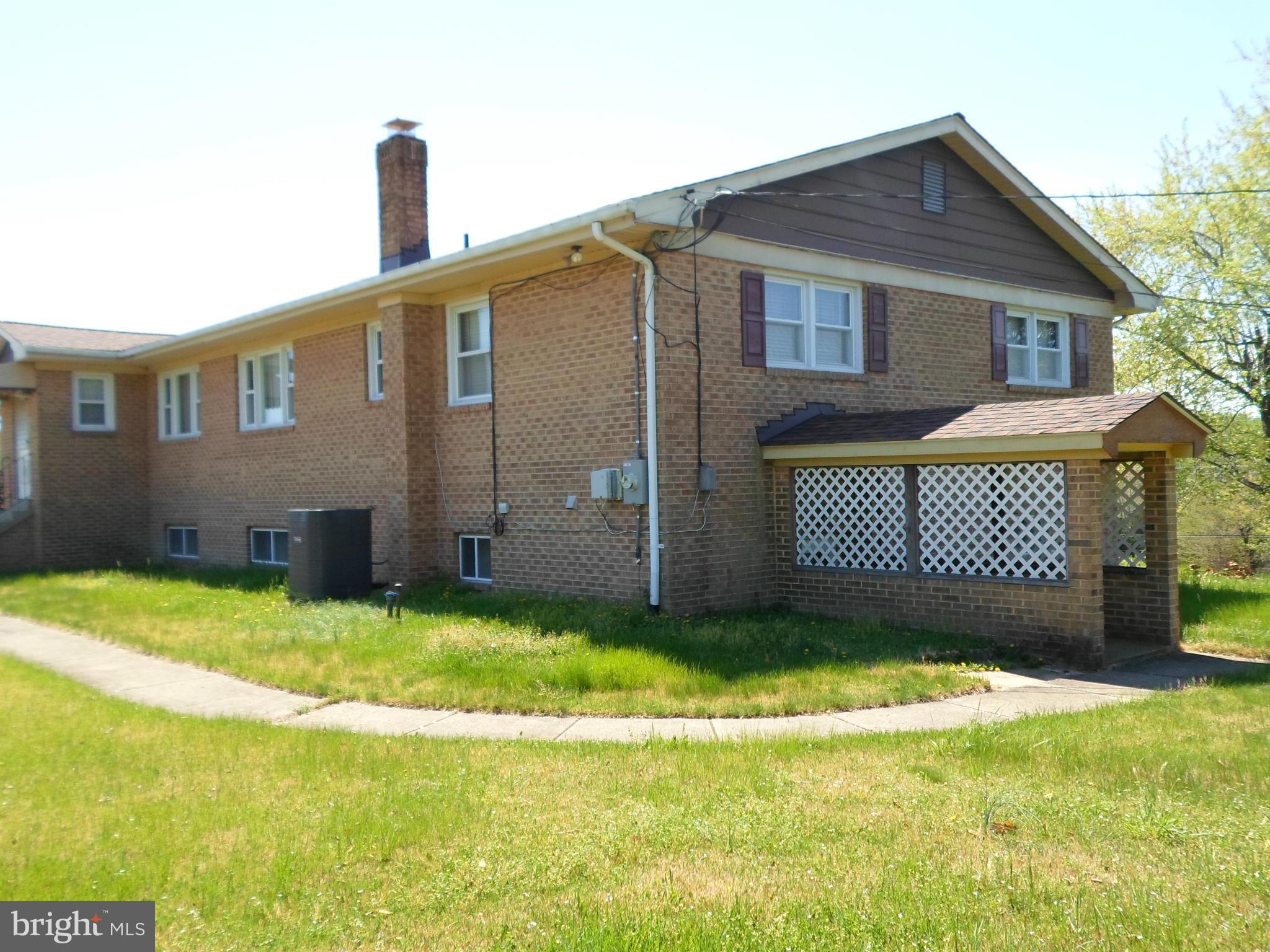 7410 South Osborne Road Upper Marlboro, MD 20772 - Photo 4 of 30 a house view with a outdoor space