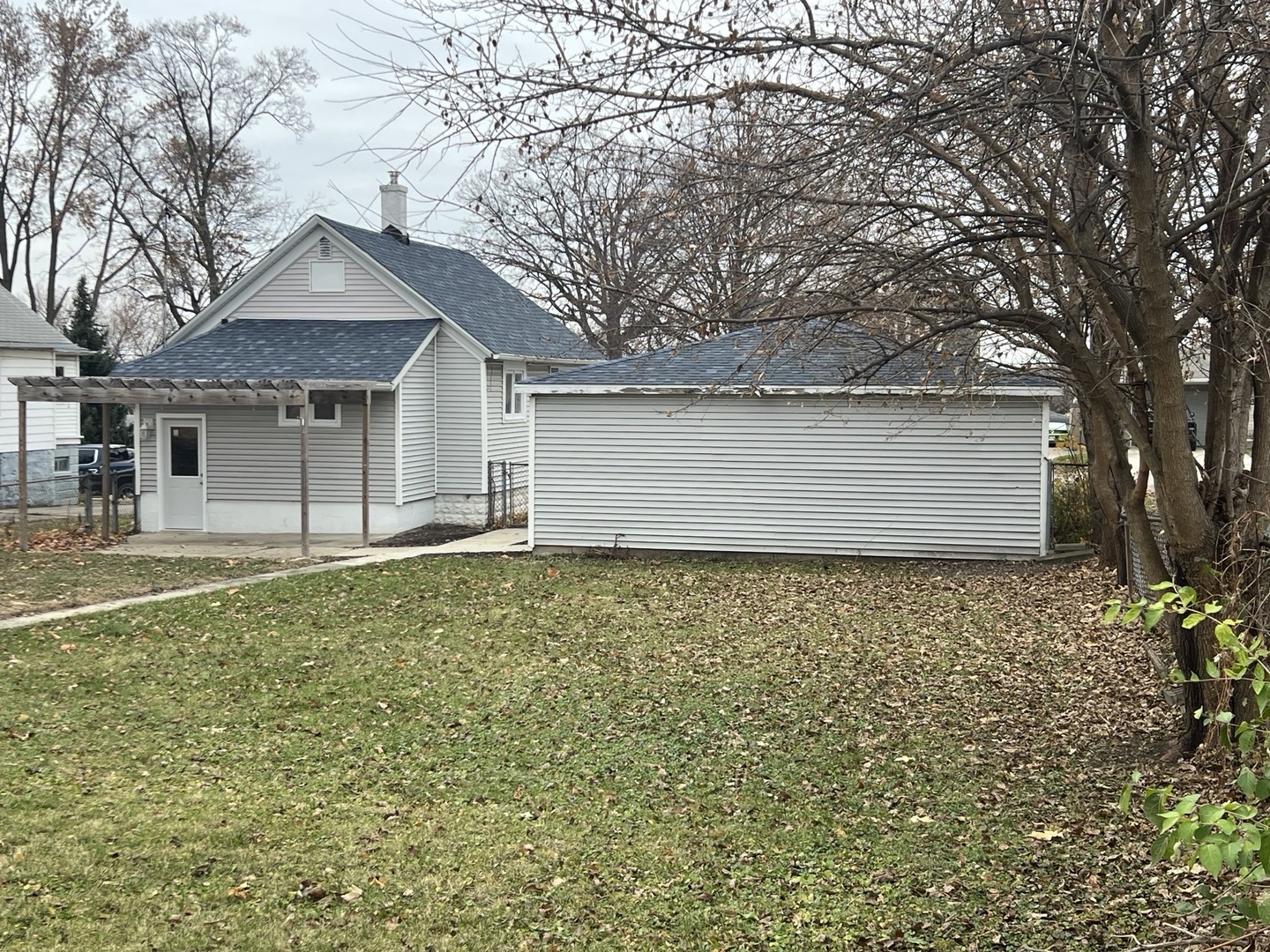 1817 Cora Street Crest Hill, IL 60403 - Photo 18 of 19 a front view of a house with garden
