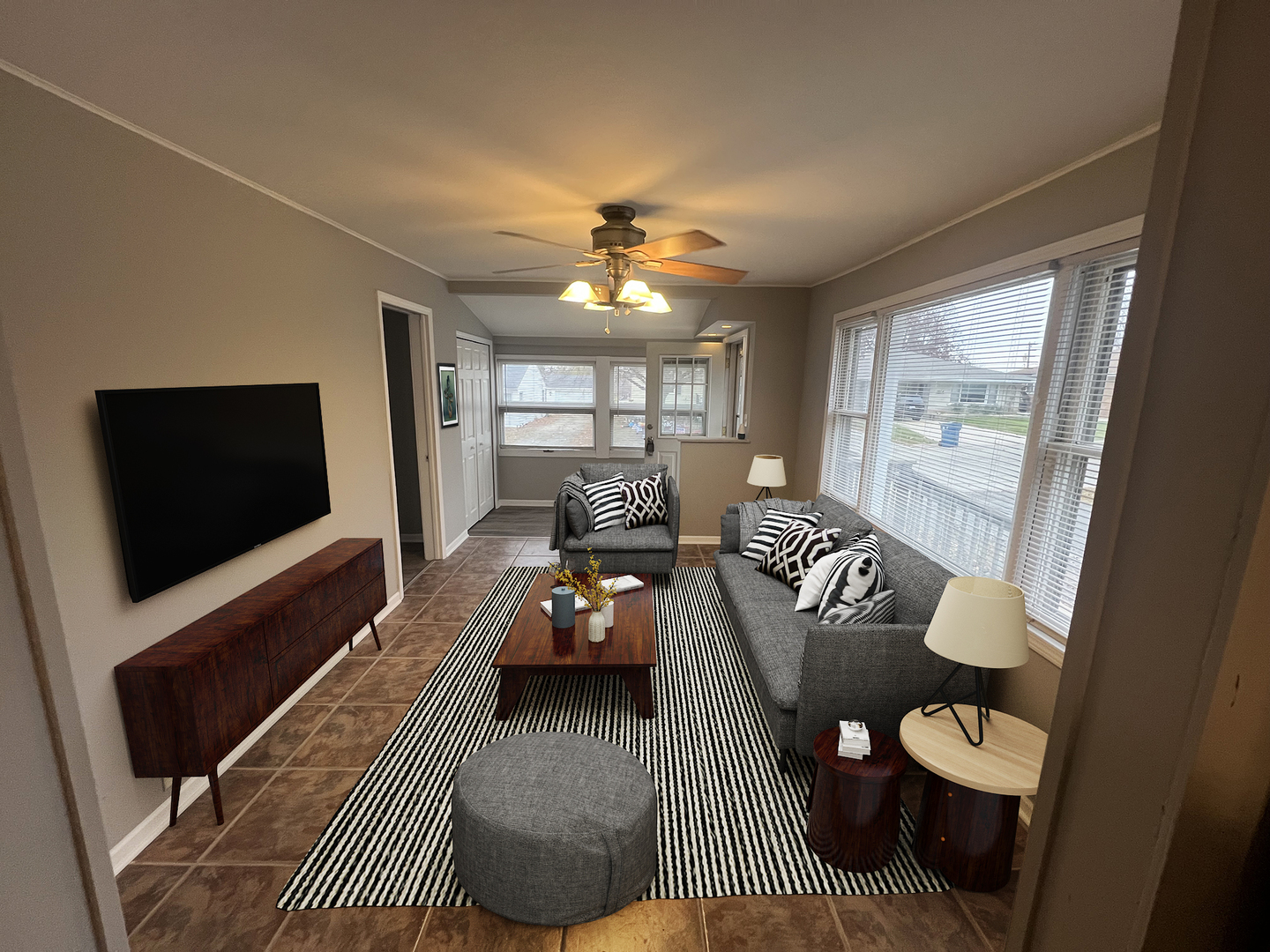 1817 Cora Street Crest Hill, IL 60403 - Photo 4 of 19 a living room with furniture and a flat screen tv