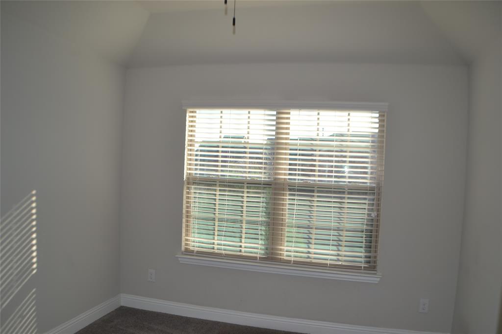 545 Teton Street Allen, TX 75002 - Photo 18 of 19 a view of an empty room with a window