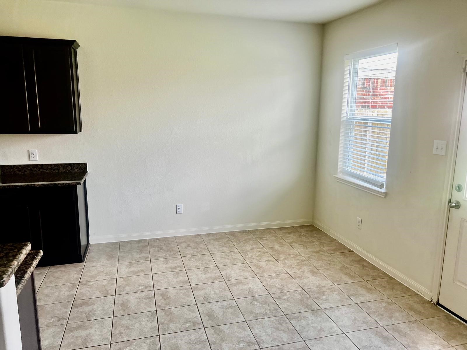 6159 El Oro Drive Houston, TX 77048 - Photo 5 of 10 a view of an empty room with a window