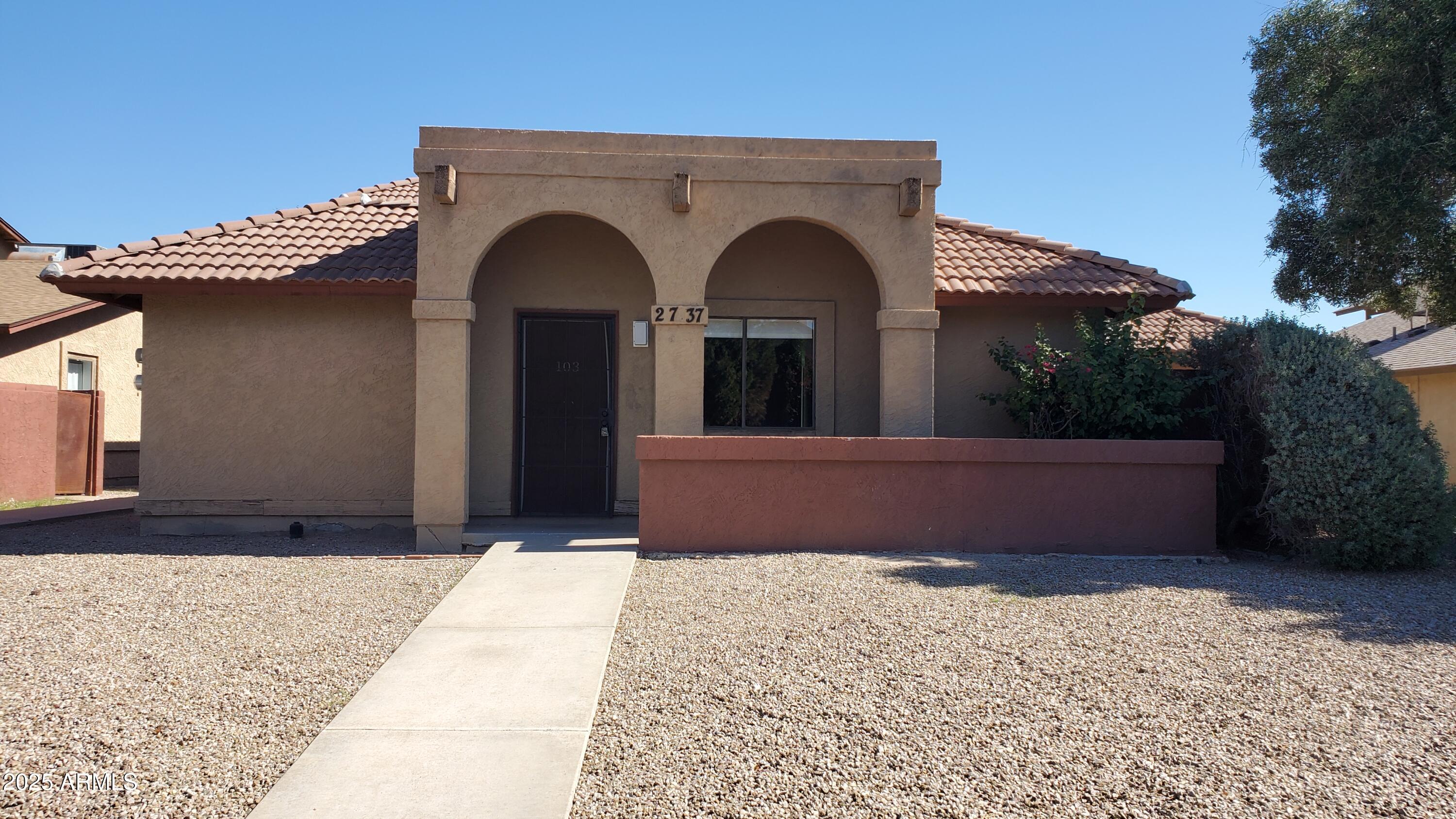 2737 North Salem, Unit 201 Mesa, AZ 85215 - Photo 1 of 17 a front view of a house