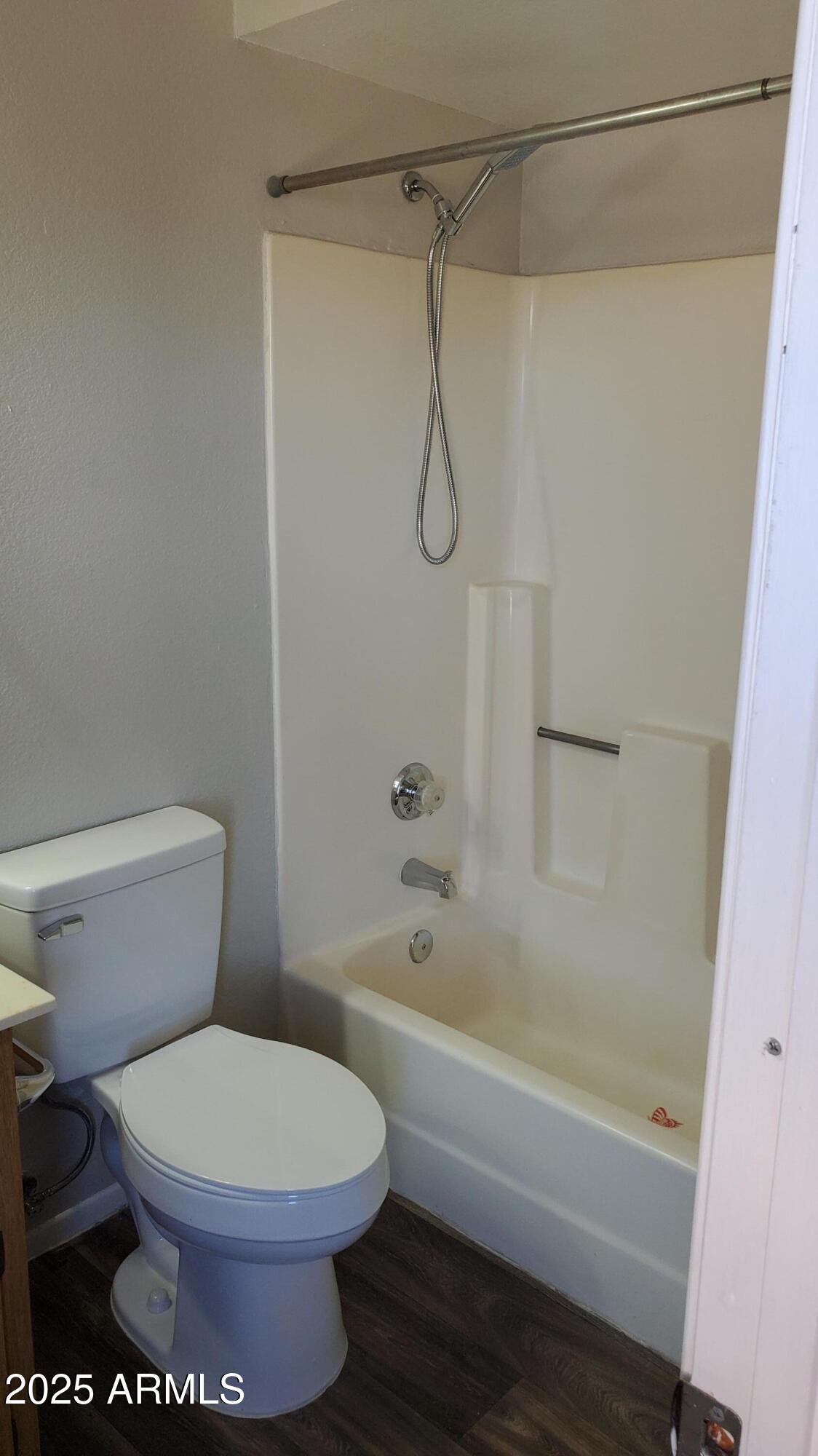 2737 North Salem, Unit 201 Mesa, AZ 85215 - Photo 13 of 17 a bathroom with a toilet and a shower