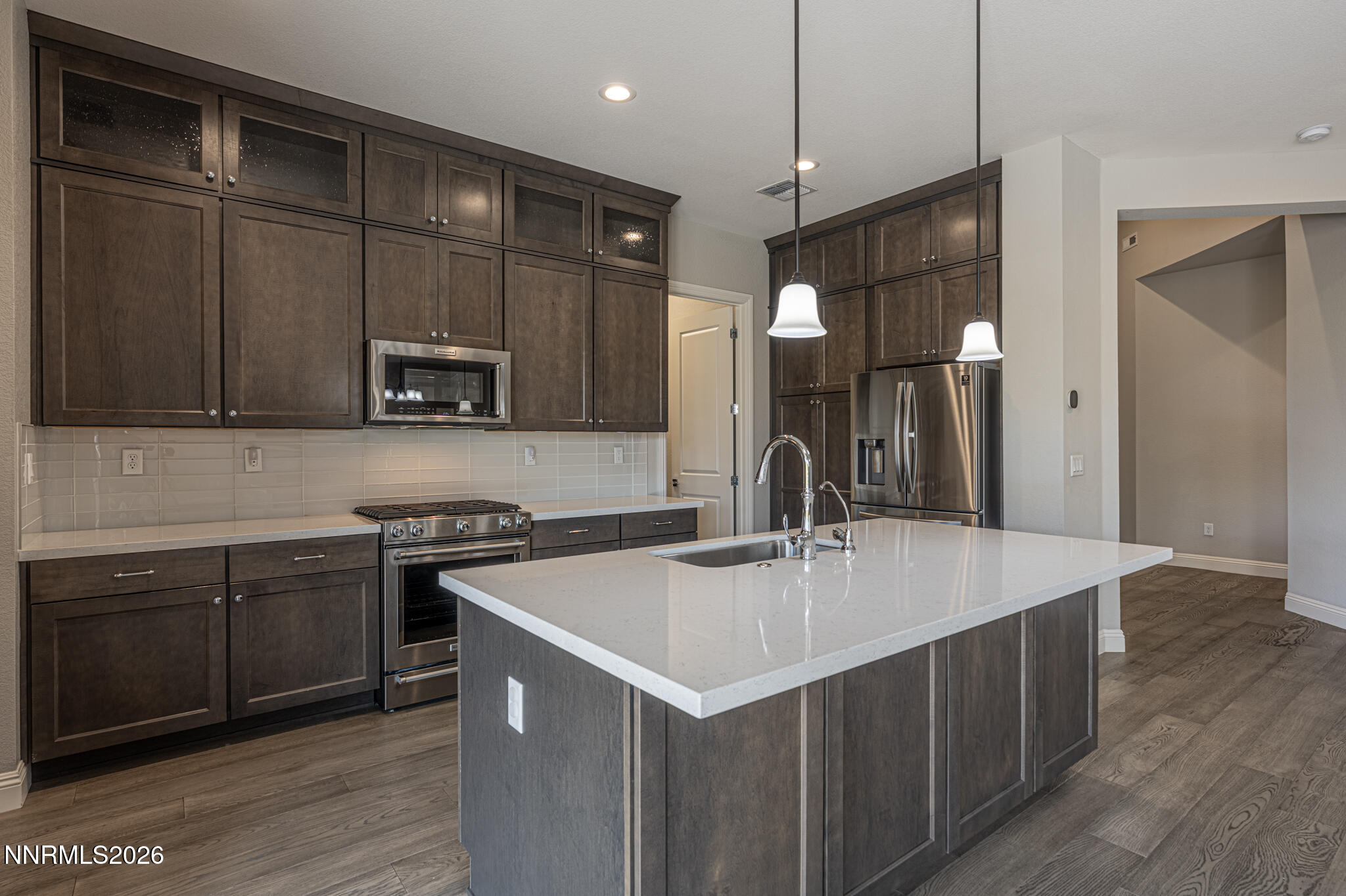 2109 Cast Iron Drive Reno, NV 89521 - Photo 5 of 35 a kitchen with a sink cabinets and wooden floor