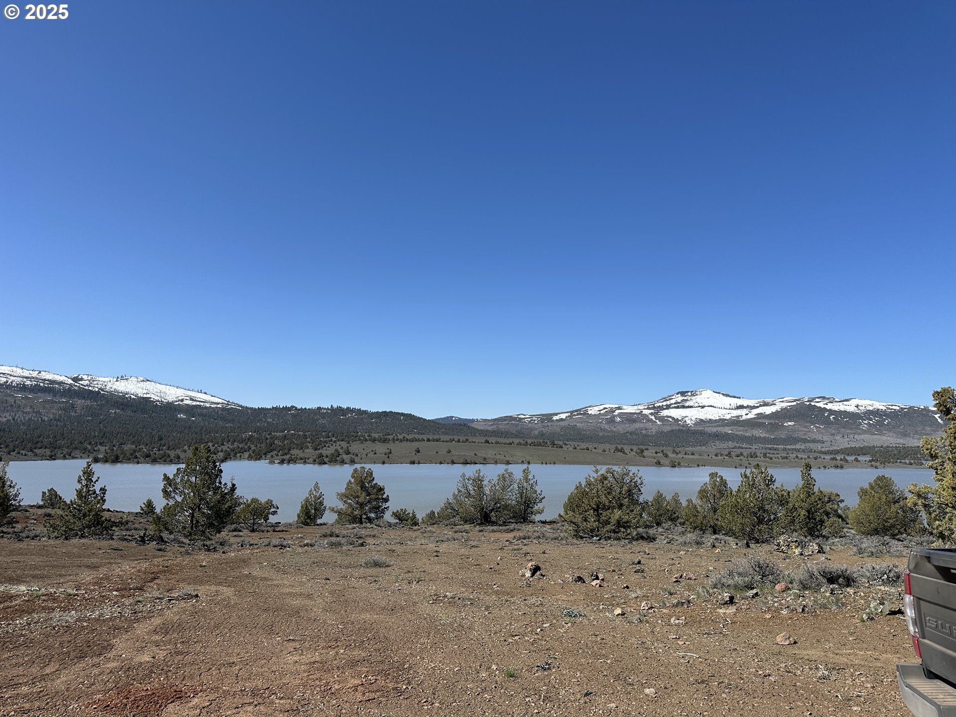 Cyhoya Way Lakeview, OR 97630 - Photo 7 of 36 a view of a lake with a big yard