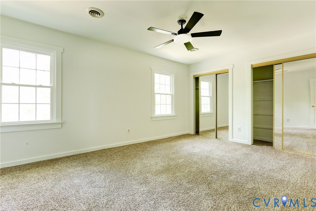 661 Greencastle Road Chesterfield, VA 23236 - Photo 18 of 28 an empty room with closet and windows