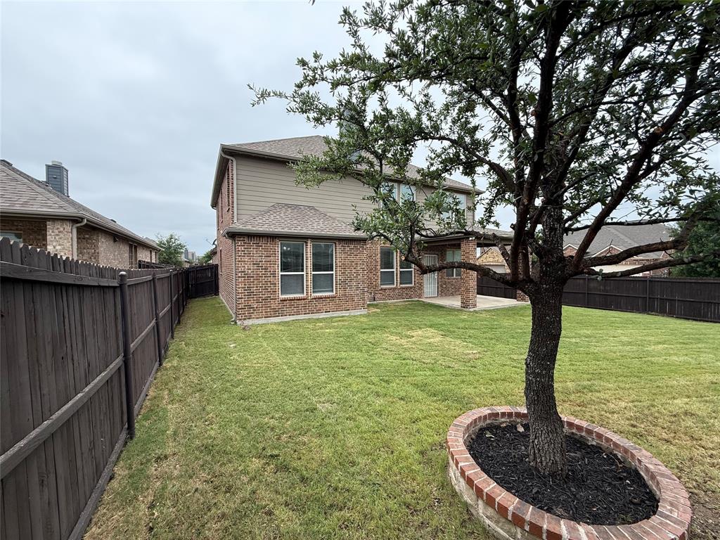 101 Rocky Pine Road McKinney, TX 75072 - Photo 10 of 39 a house view with a garden space