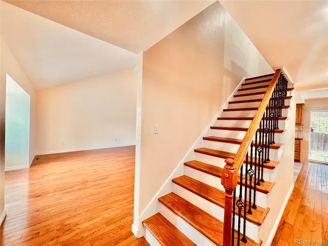 a view of entryway with wooden floor