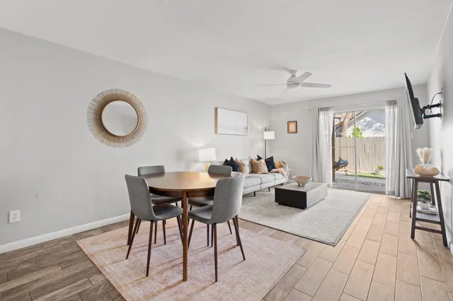 a view of a dining room with furniture