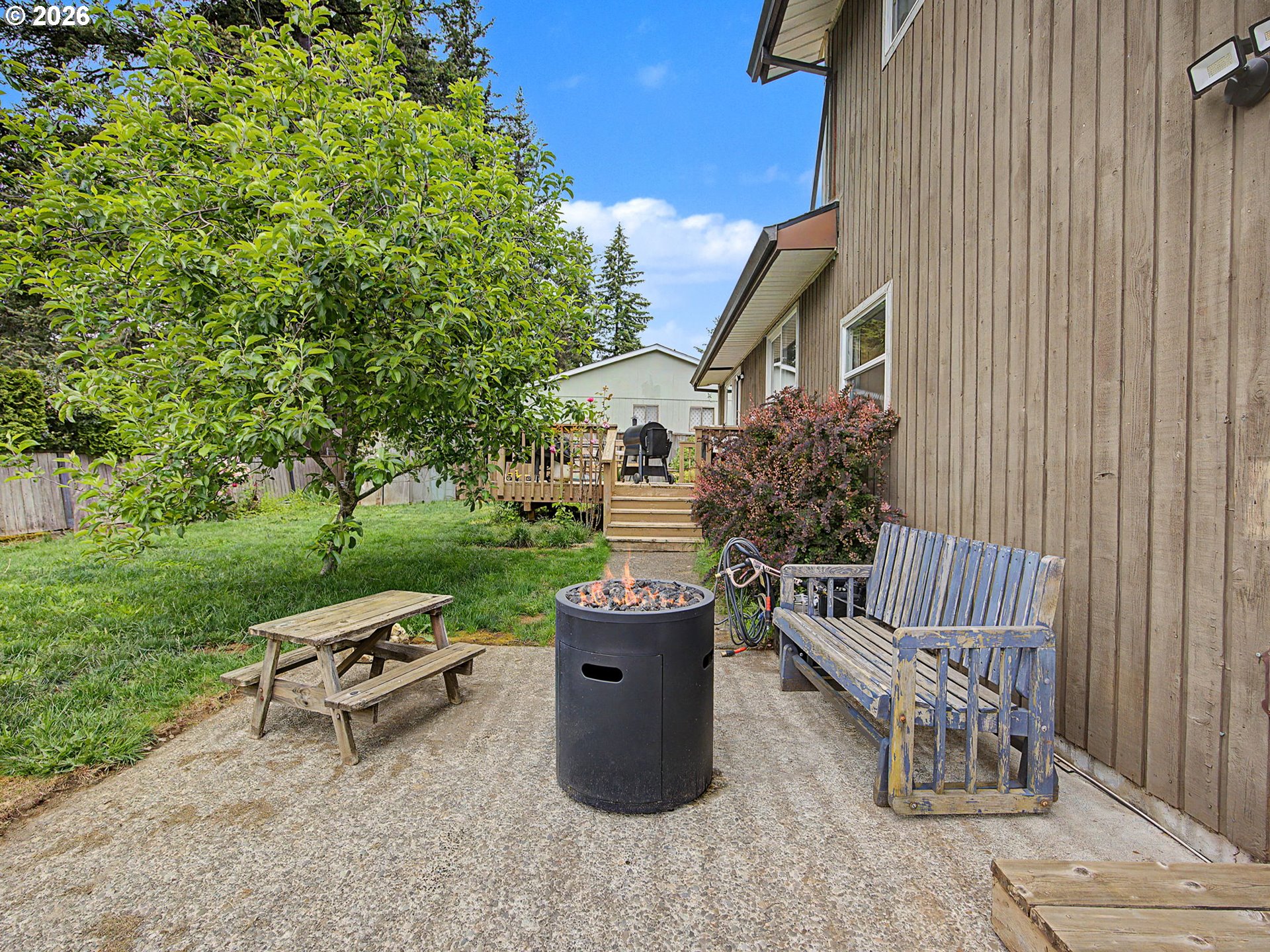 18015 Davis Street Sandy, OR 97055 - Photo 31 of 40 a view of backyard with deck and outdoor seating