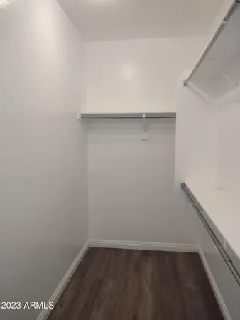 a view of an empty walk in closet