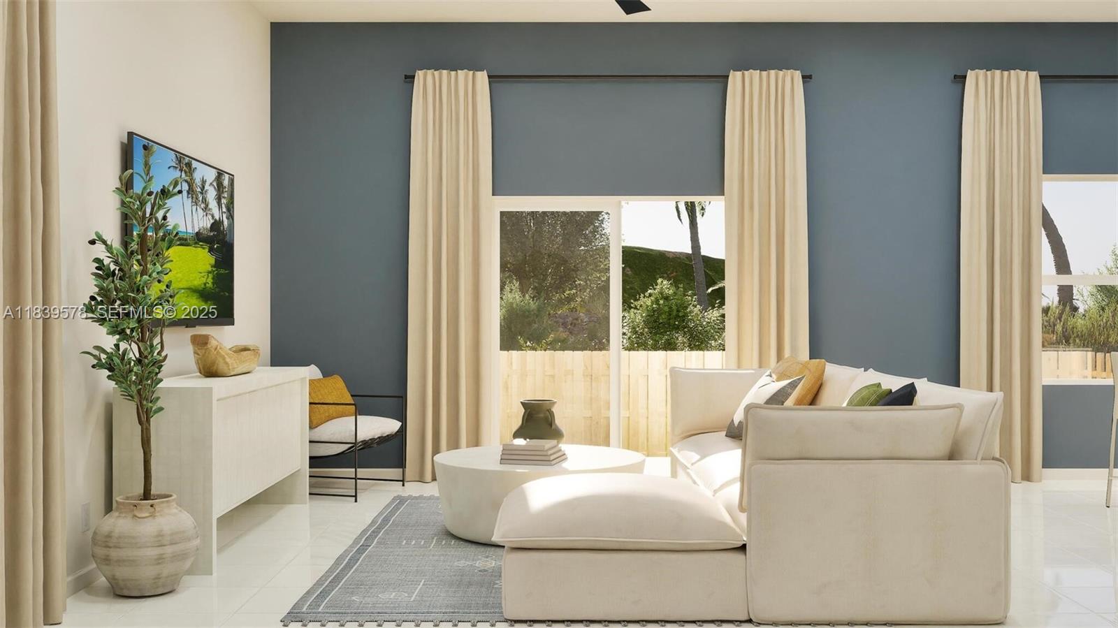18849 Southwest 314th Street Homestead, FL 33030 - Photo 5 of 9 a living room with furniture and a large window