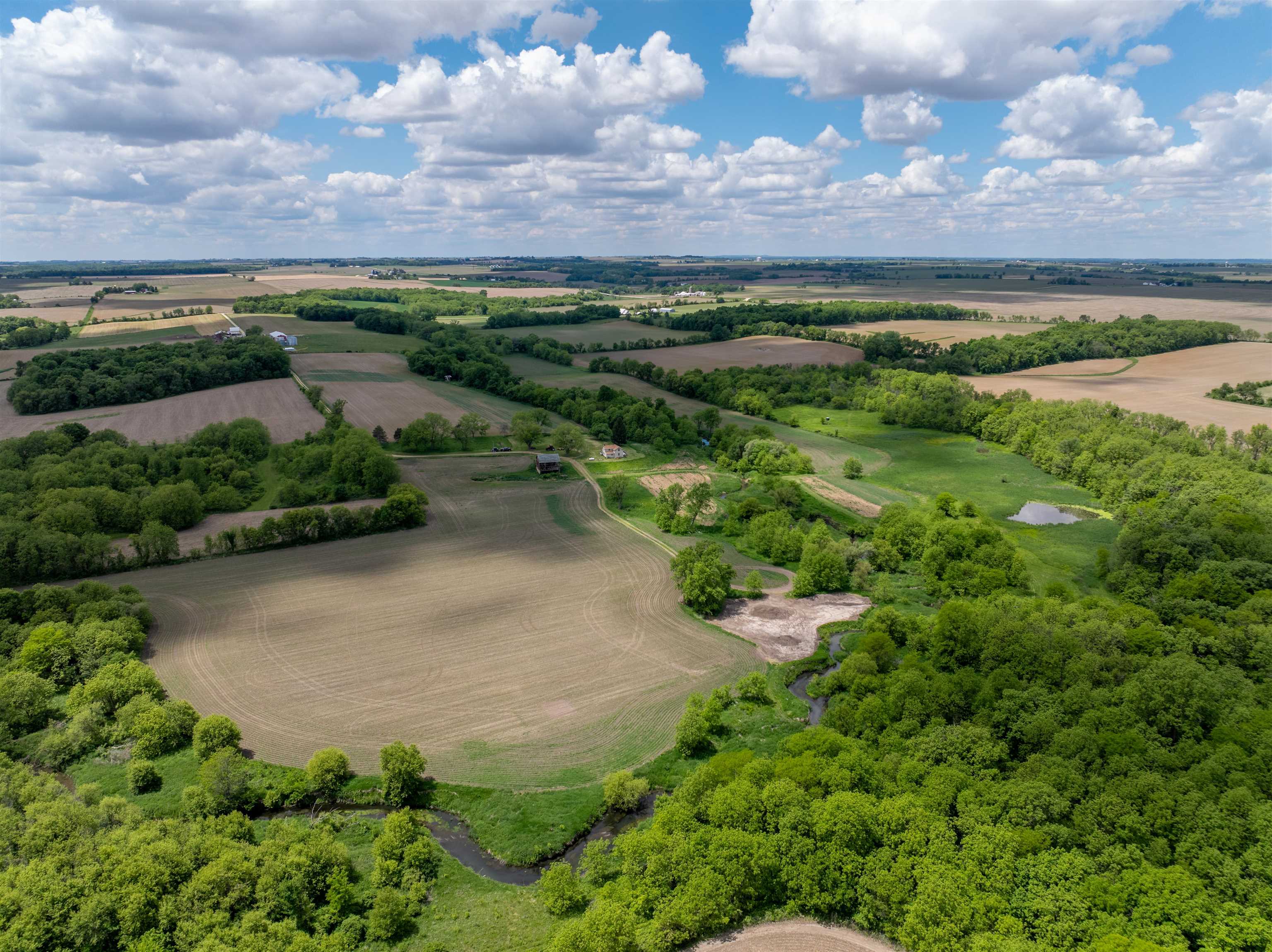 10385 North Rock City Road Leaf River, IL 61047 - Photo 1 of 99 a view of a lake with a yard