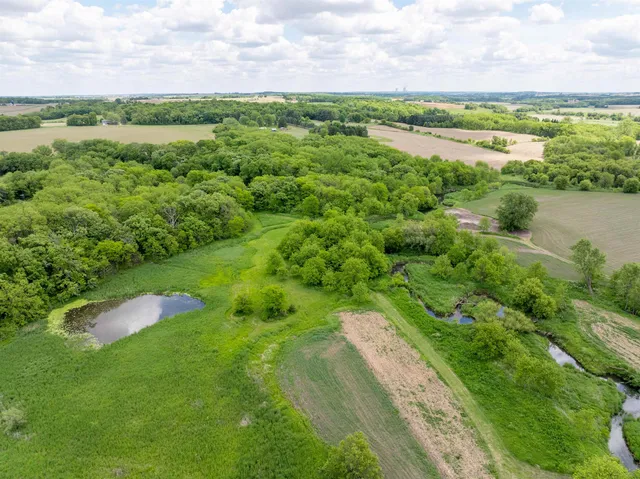 an aerial view of a houses with outdoor space and street view