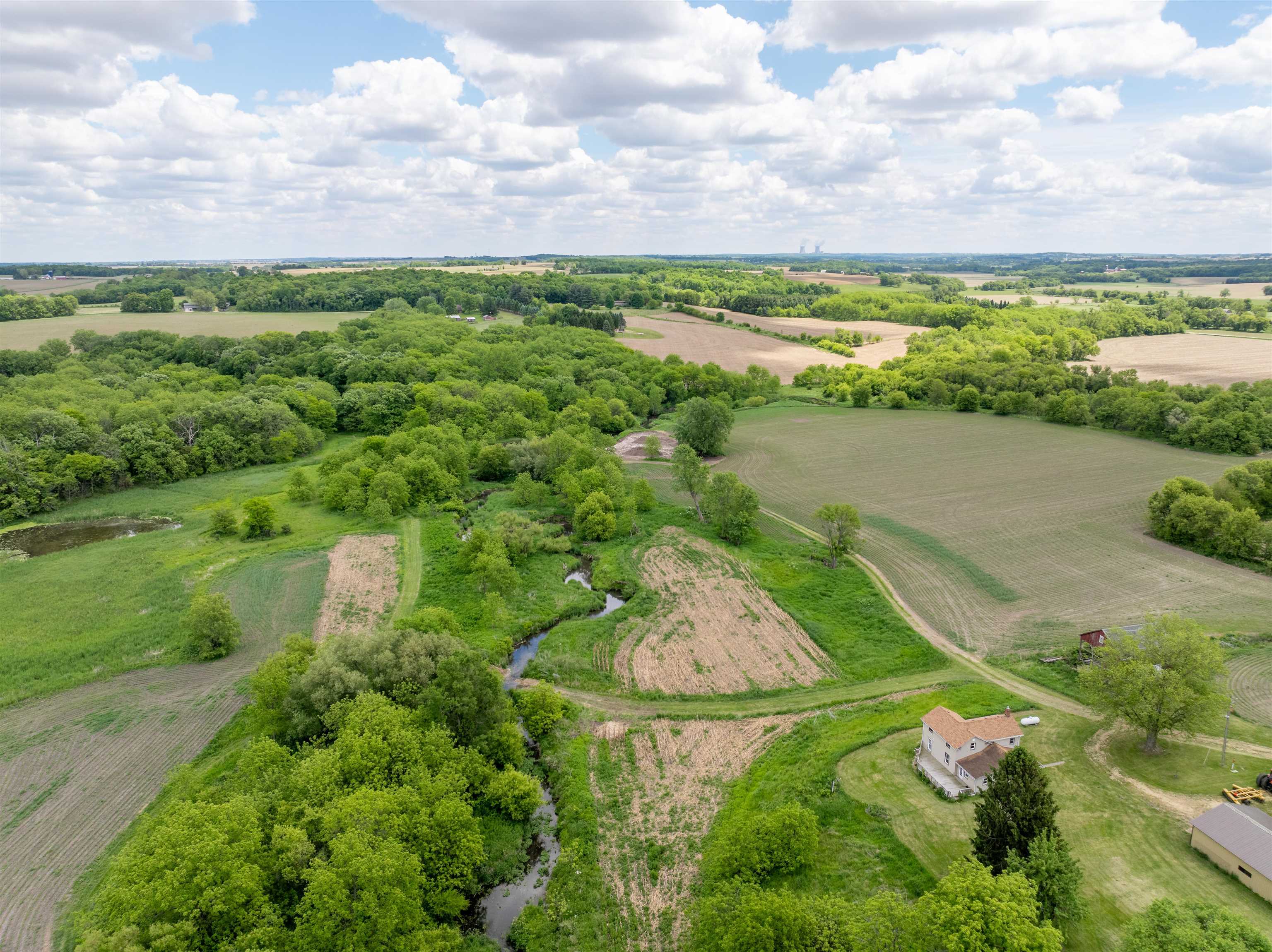 10385 North Rock City Road Leaf River, IL 61047 - Photo 12 of 99 a view of a lake with a yard