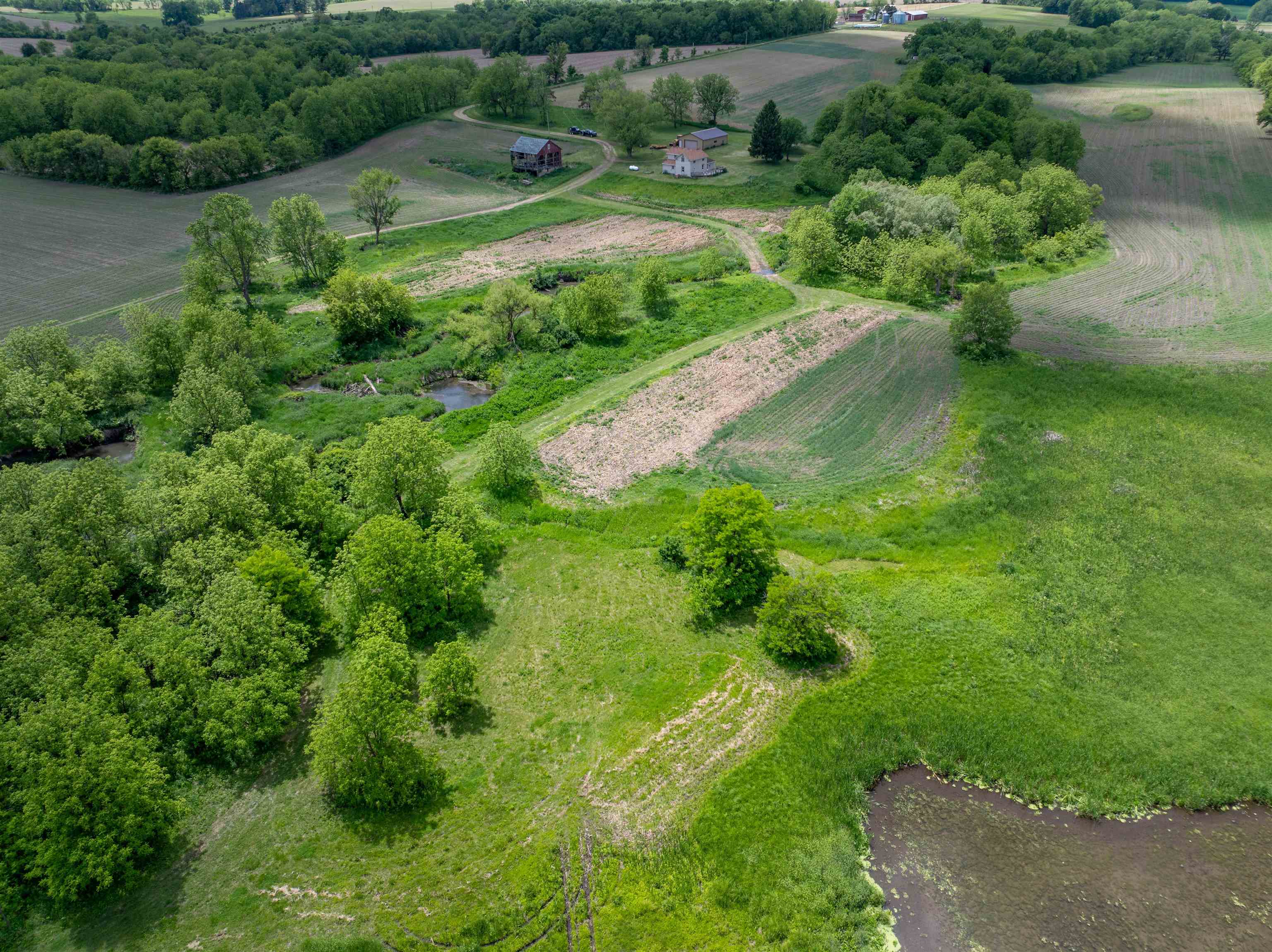 10385 North Rock City Road Leaf River, IL 61047 - Photo 30 of 99 an aerial view of a garden with houses