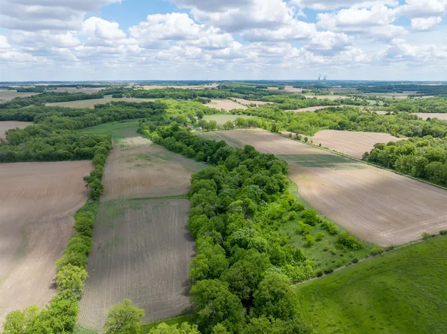 a view of a lake view with houses in back