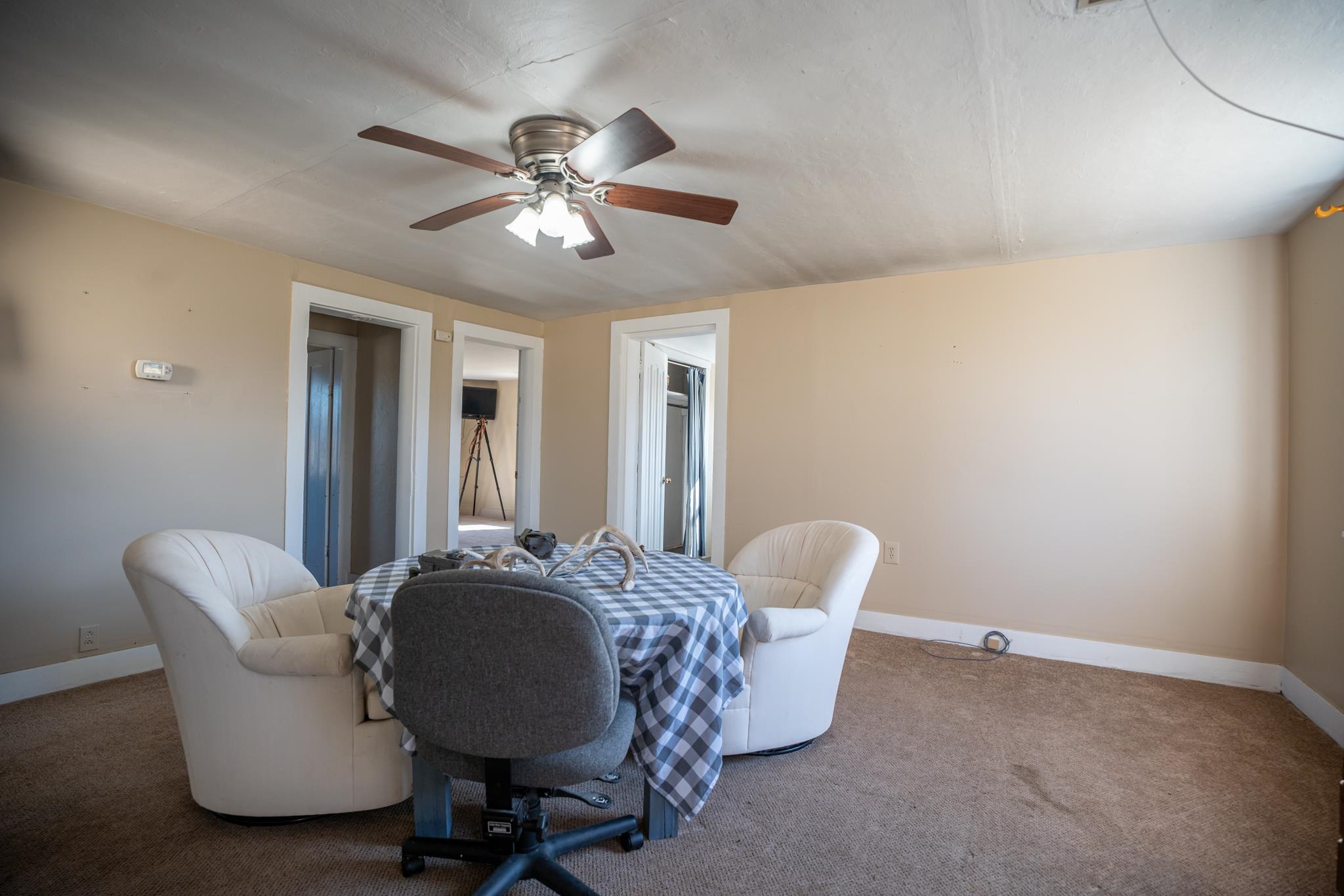 10385 North Rock City Road Leaf River, IL 61047 - Photo 42 of 99 a living room with furniture and a chandelier