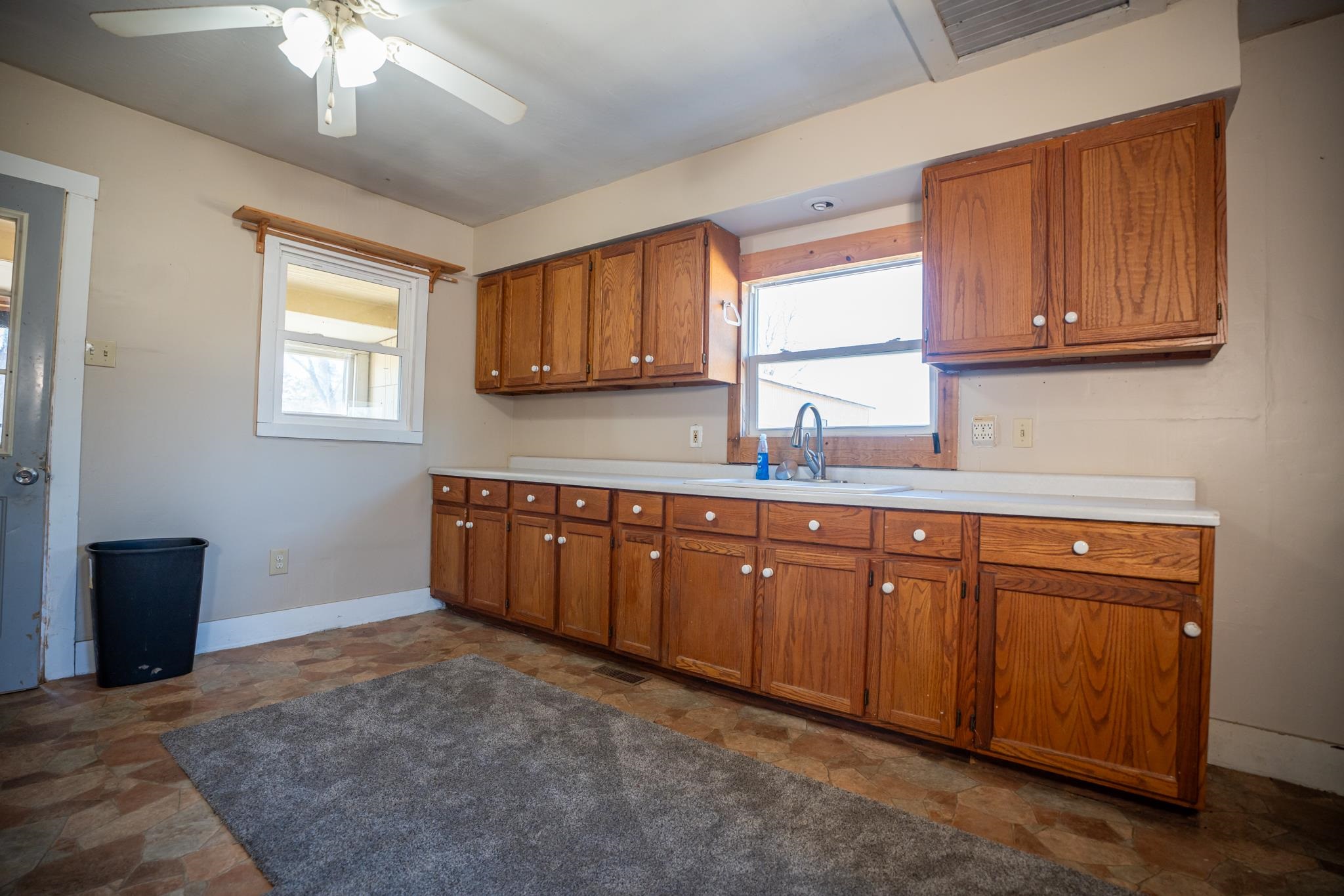 10385 North Rock City Road Leaf River, IL 61047 - Photo 45 of 99 a kitchen with stainless steel appliances granite countertop a sink window and cabinets