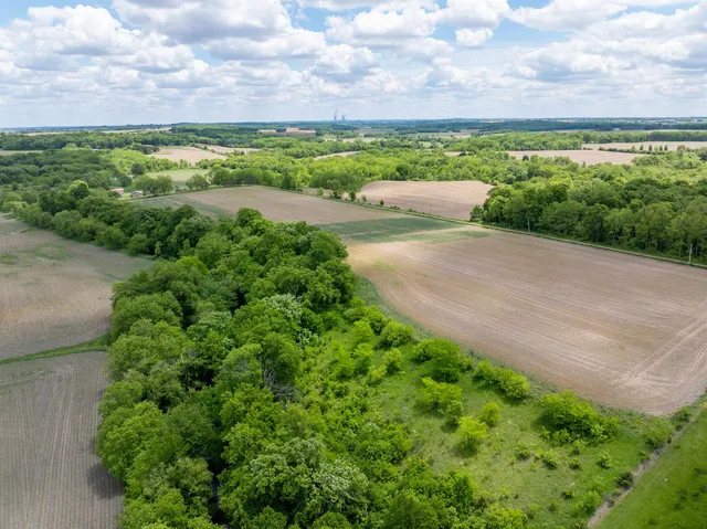 a view of a lake with a yard
