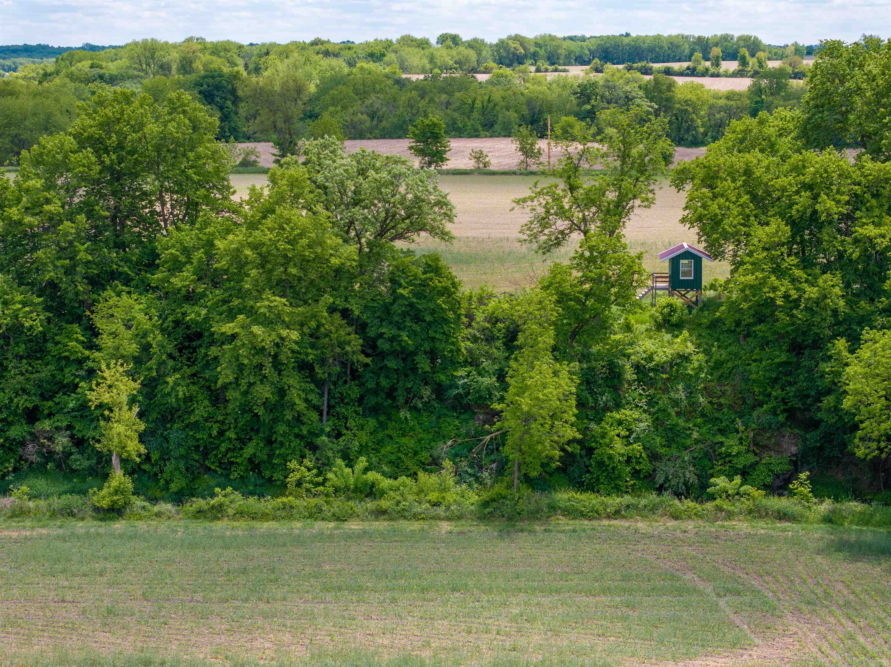 10385 North Rock City Road Leaf River, IL 61047 - Photo 55 of 99 a view of a lake view with houses in back