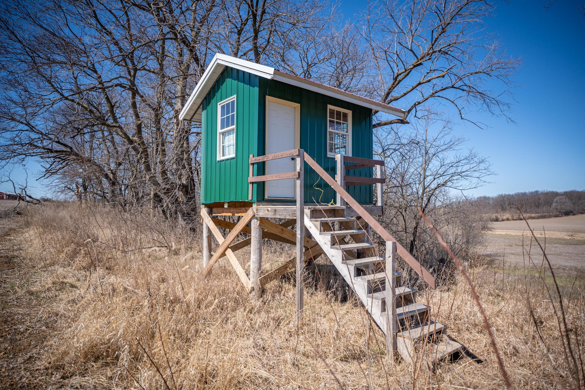 10385 North Rock City Road Leaf River, IL 61047 - Photo 73 of 99 a front view of a house with a yard