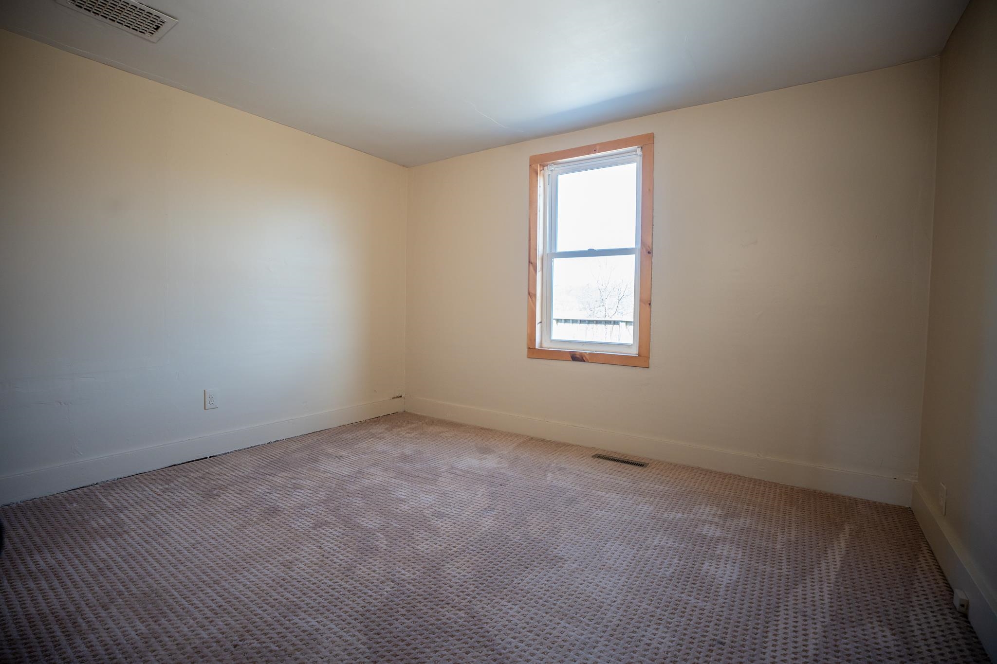 10385 North Rock City Road Leaf River, IL 61047 - Photo 87 of 99 an empty room with a window