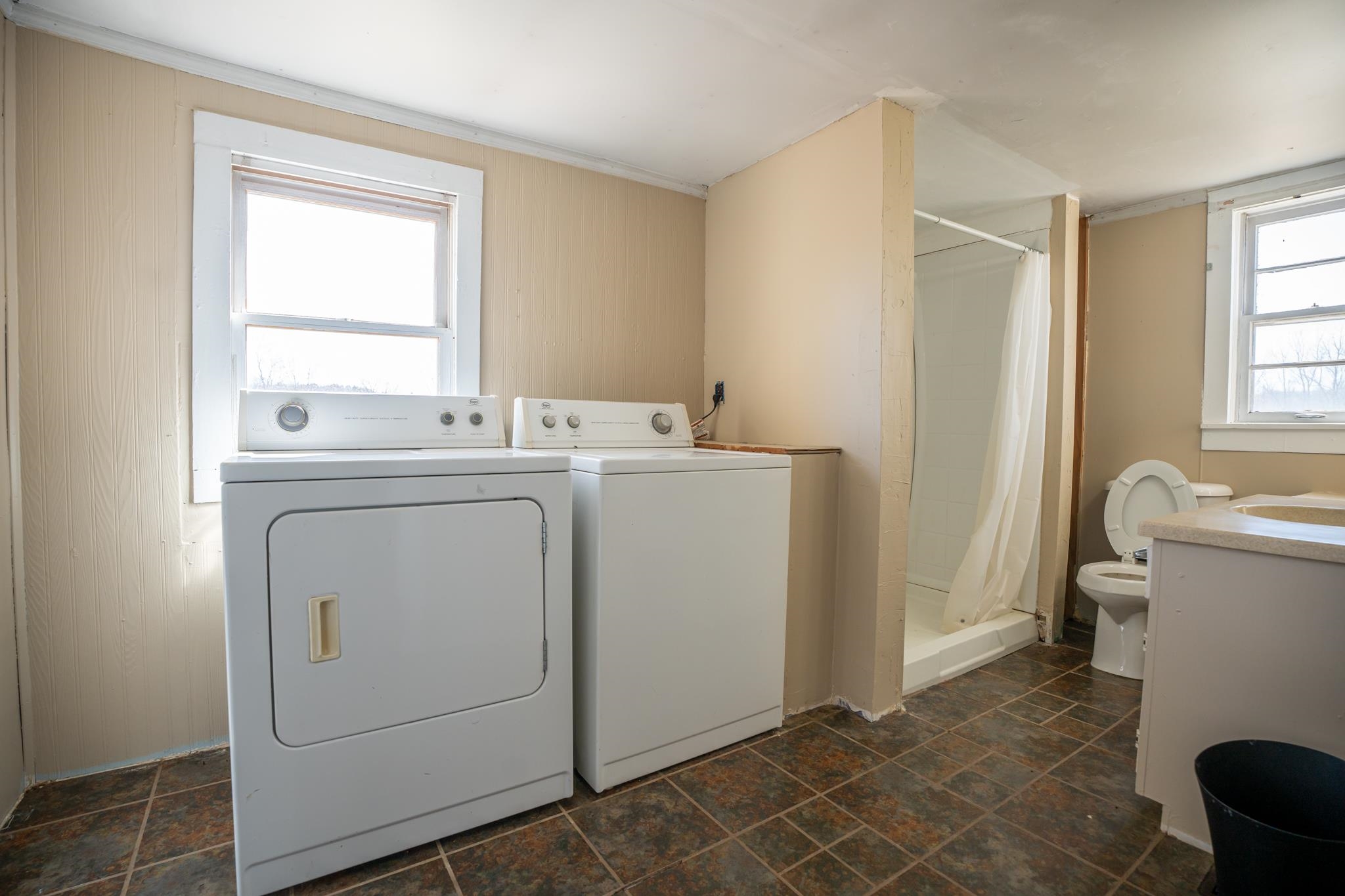 10385 North Rock City Road Leaf River, IL 61047 - Photo 93 of 99 a utility room with dryer and washer