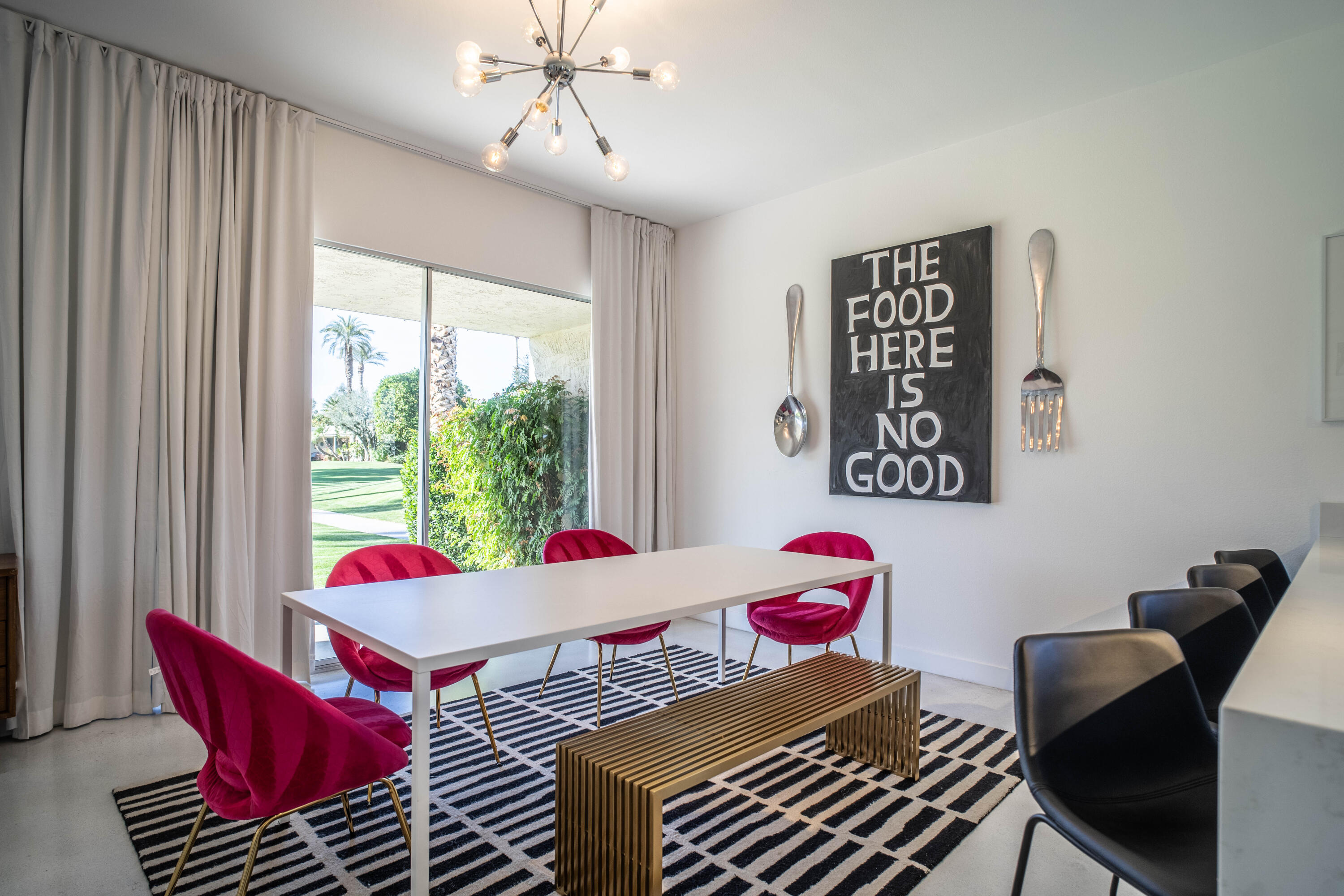 45705 Pawnee Road Indian Wells, CA 92210 - Photo 12 of 59 a living room with furniture and a large window