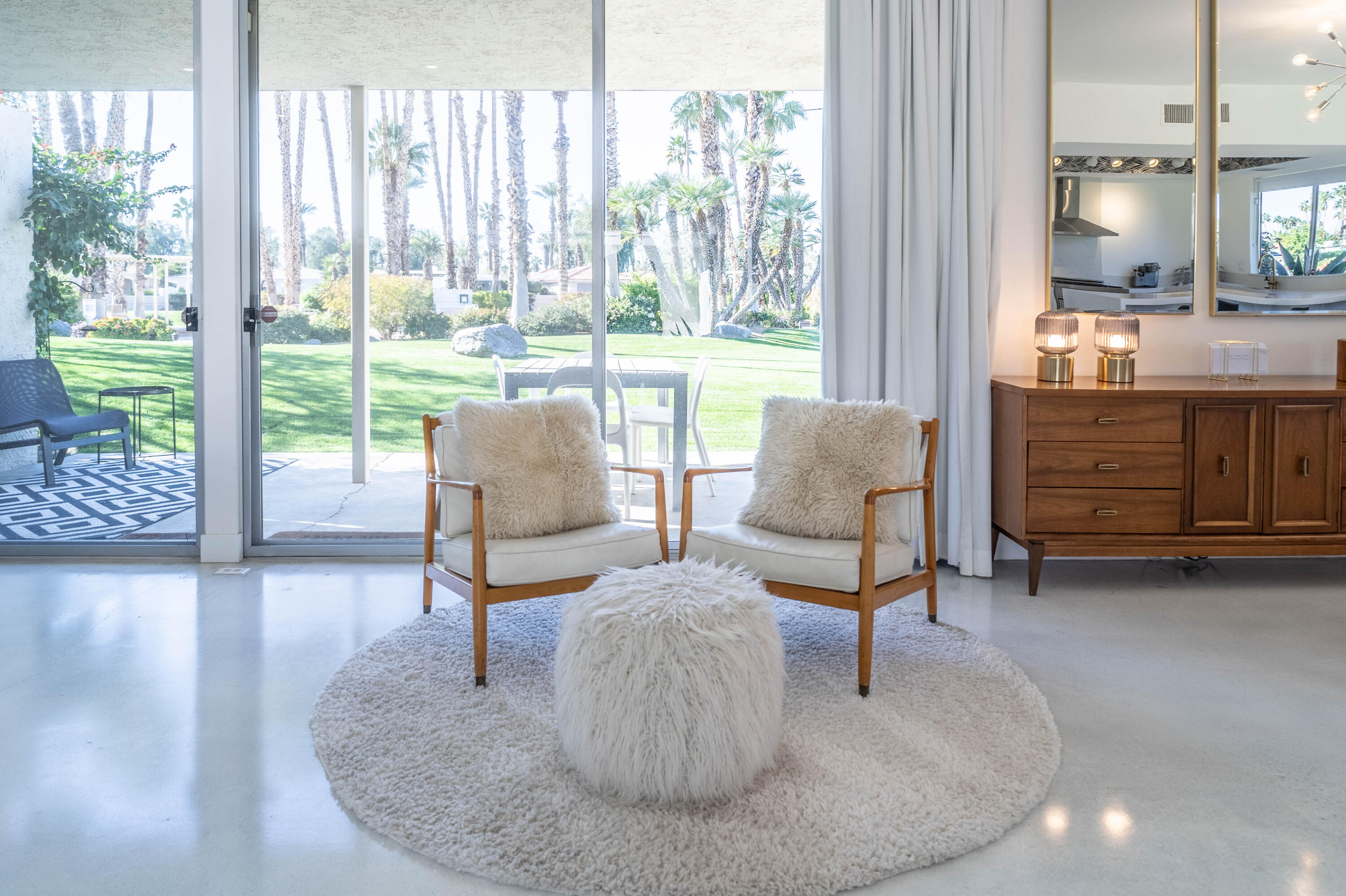 45705 Pawnee Road Indian Wells, CA 92210 - Photo 19 of 59 a living room with furniture and a large window